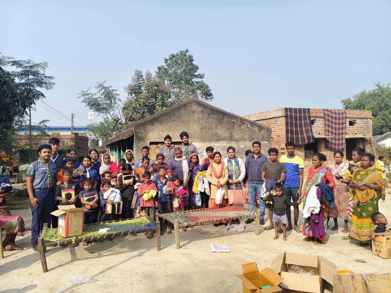 Distribution of good conditioned clothes by Scouts and Guides of KSMS